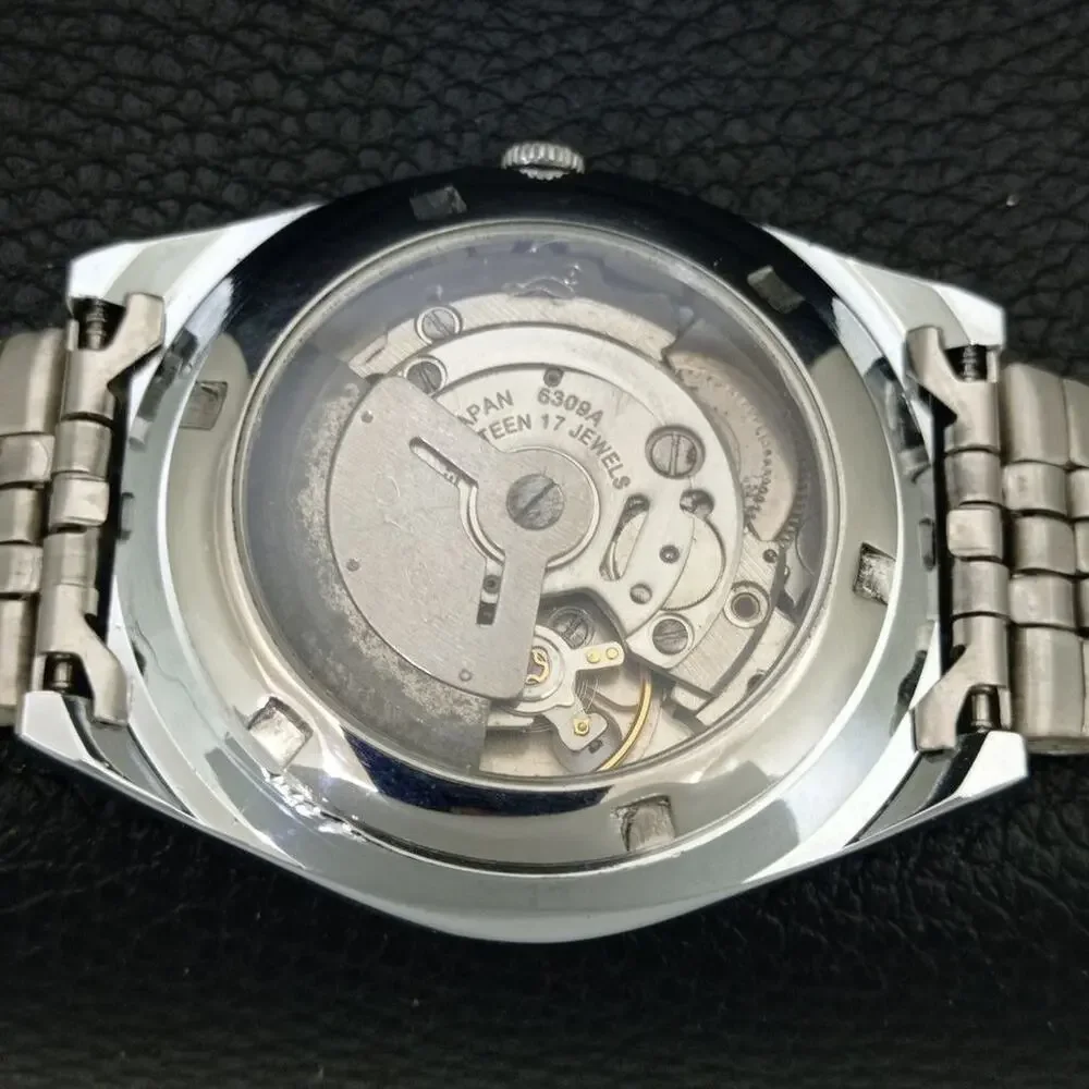 Vintage 1976 Seiko Automatic Mens Silver Watch W/daydate & Black accents